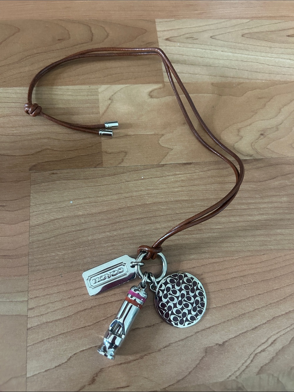 Coach Brown Leather Charm Necklace with Silver and Pink Accents - Picture 3 of 4